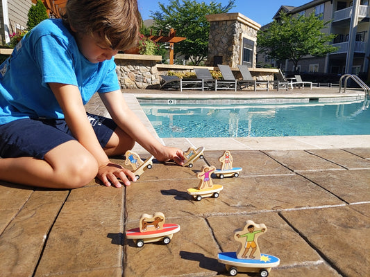 Hang ten with these pull back surfer racers. Pull back and let go for a burst of speed!