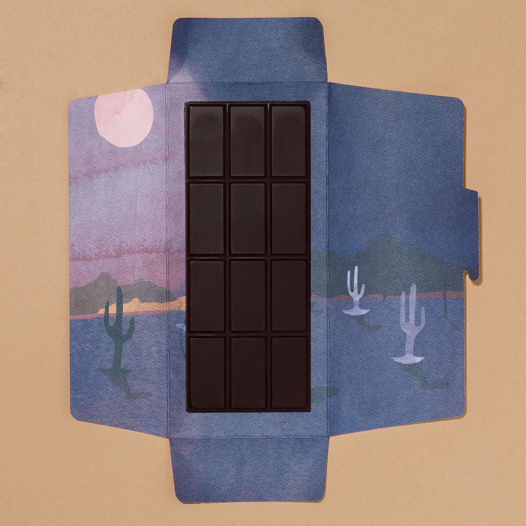 Heirloom chocolate bar with tasting notes of dark fruit, oak, and whiskey.