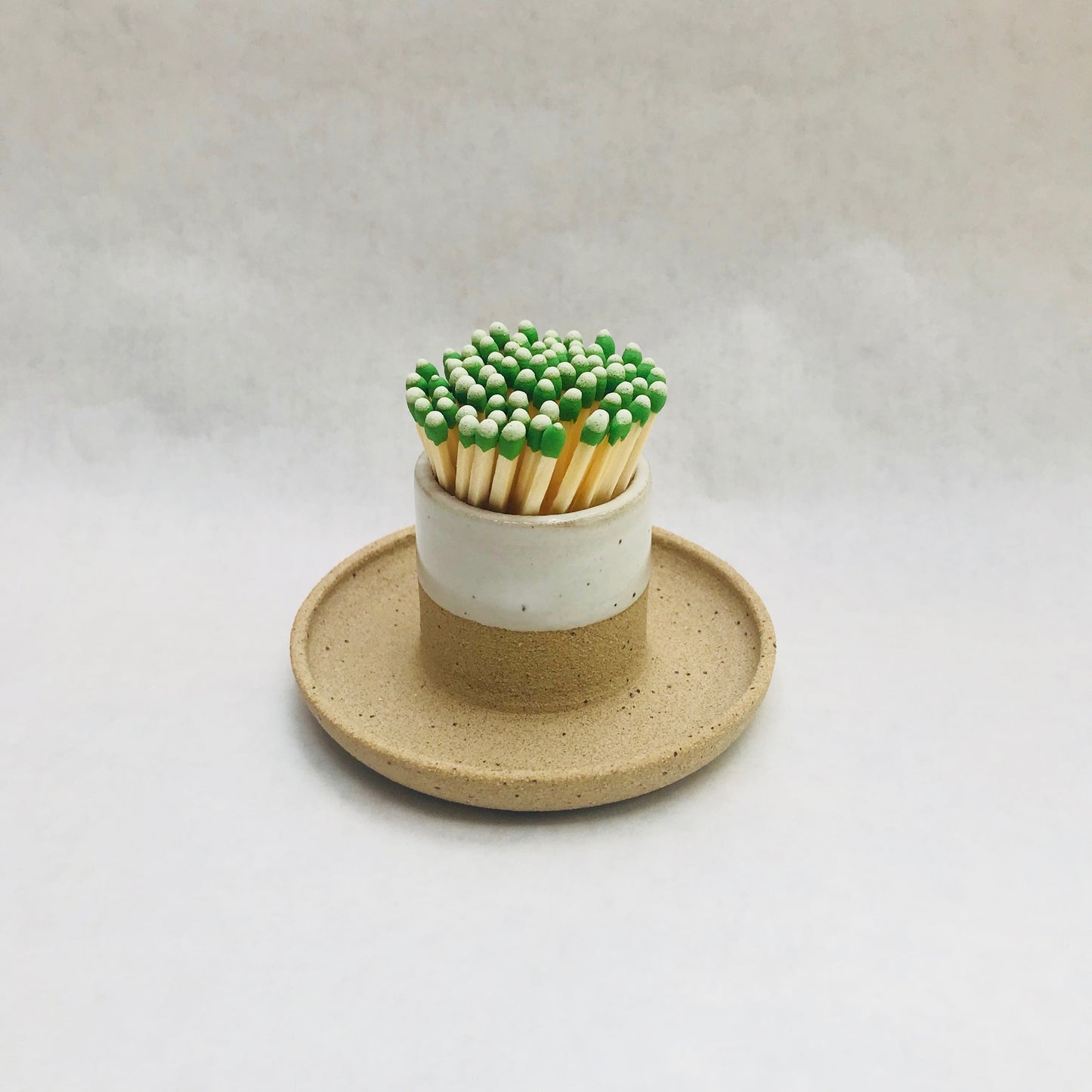 Handmade ceramic match striker with an attached tray. Each item is made individually in Olympia, Washington.