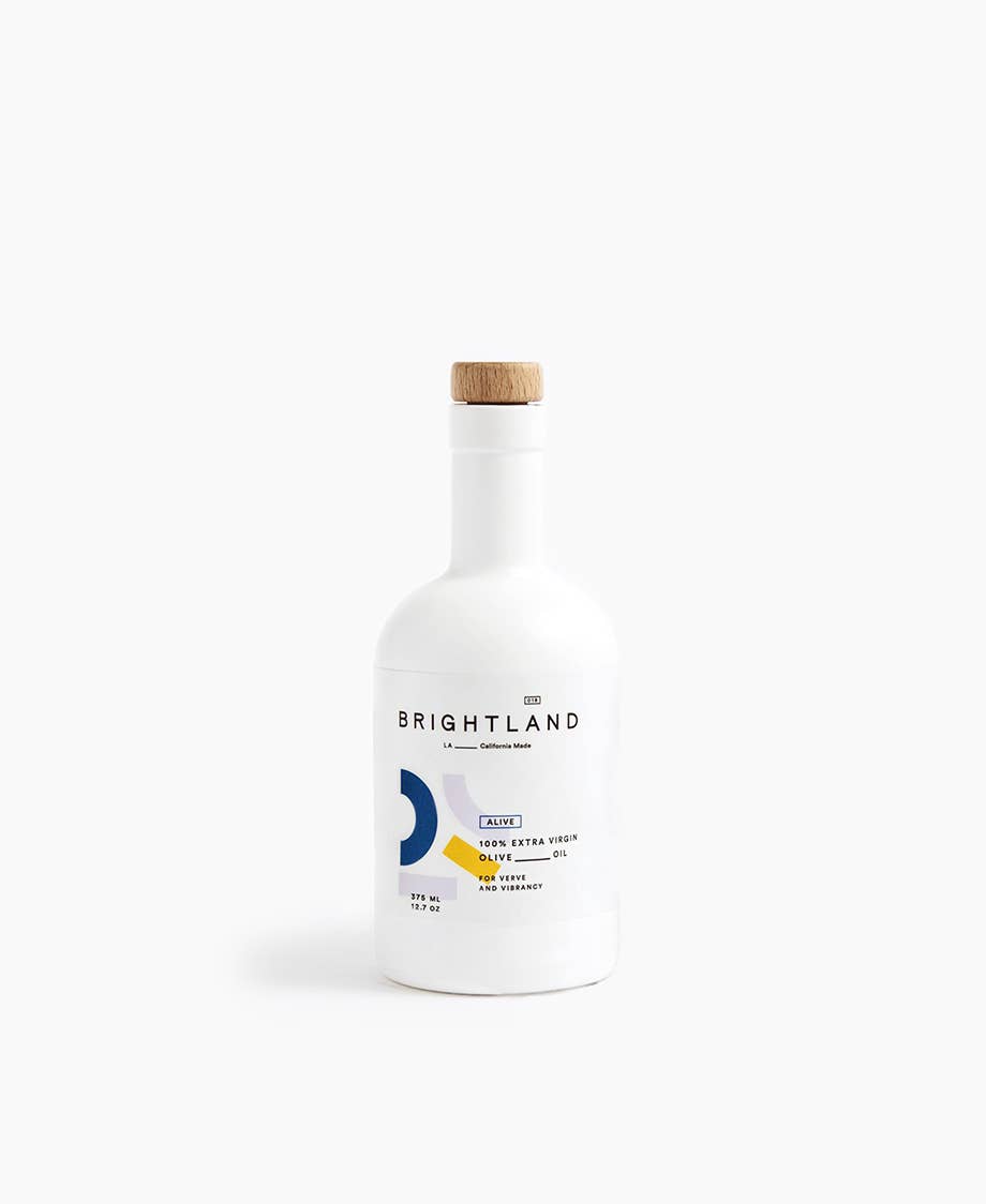 Alive is Brightland's smooth and grassy cold-pressed extra virgin olive oil ideal for salads, hummus, baked goods, fresh greens, and bread. Made with early-harvest arbequina, arbosana, and koroneiki olives grown on small family farms in California’s central valley.