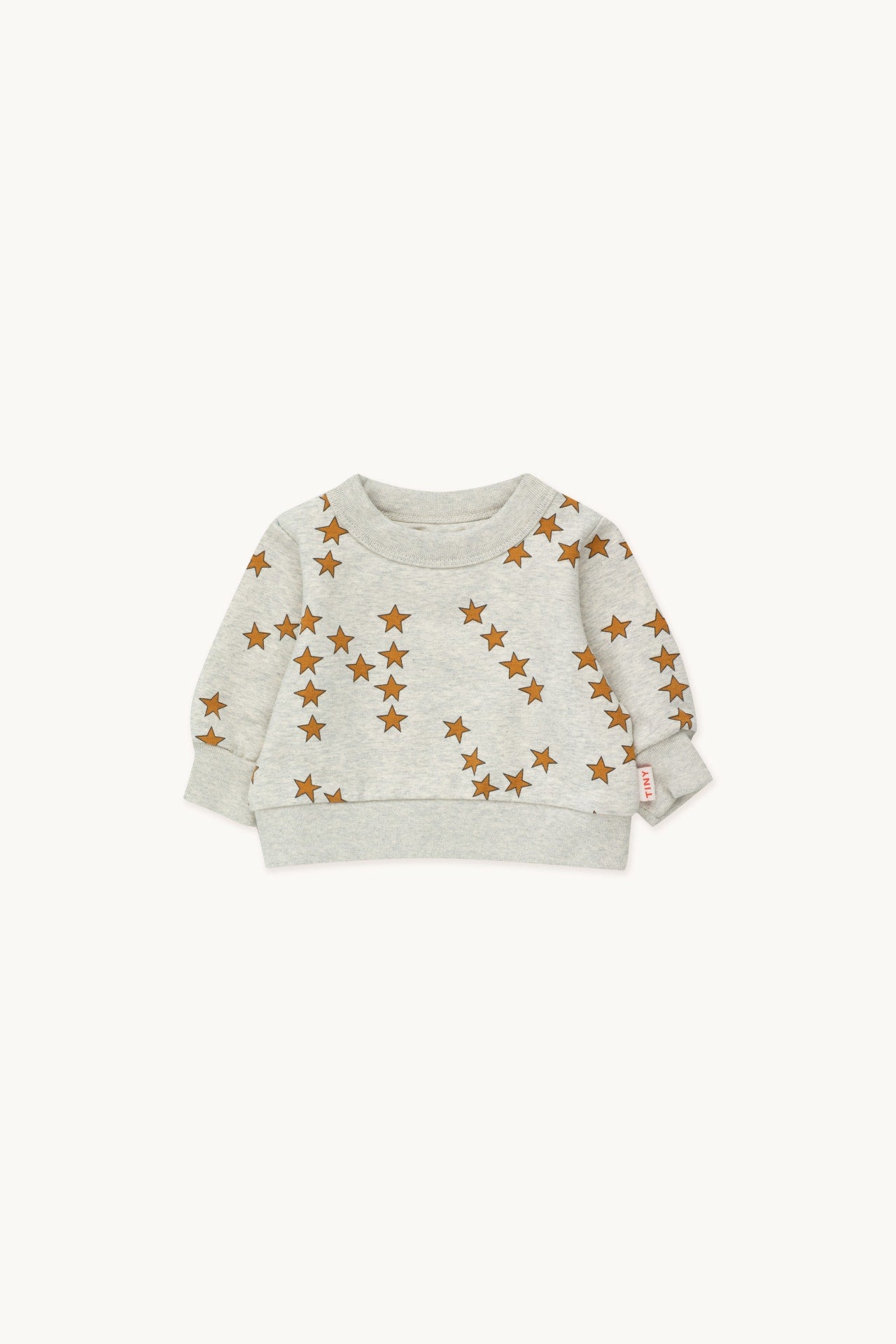Tiny Stars sweatshirt on a grey blank by Tiny Cottons
