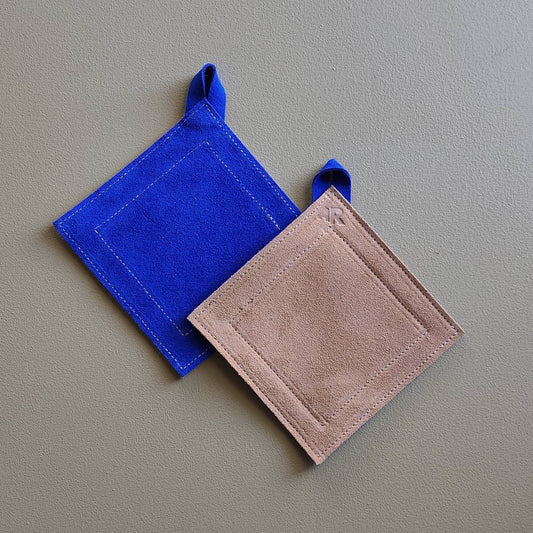 Double-sided suede potholder with loop.