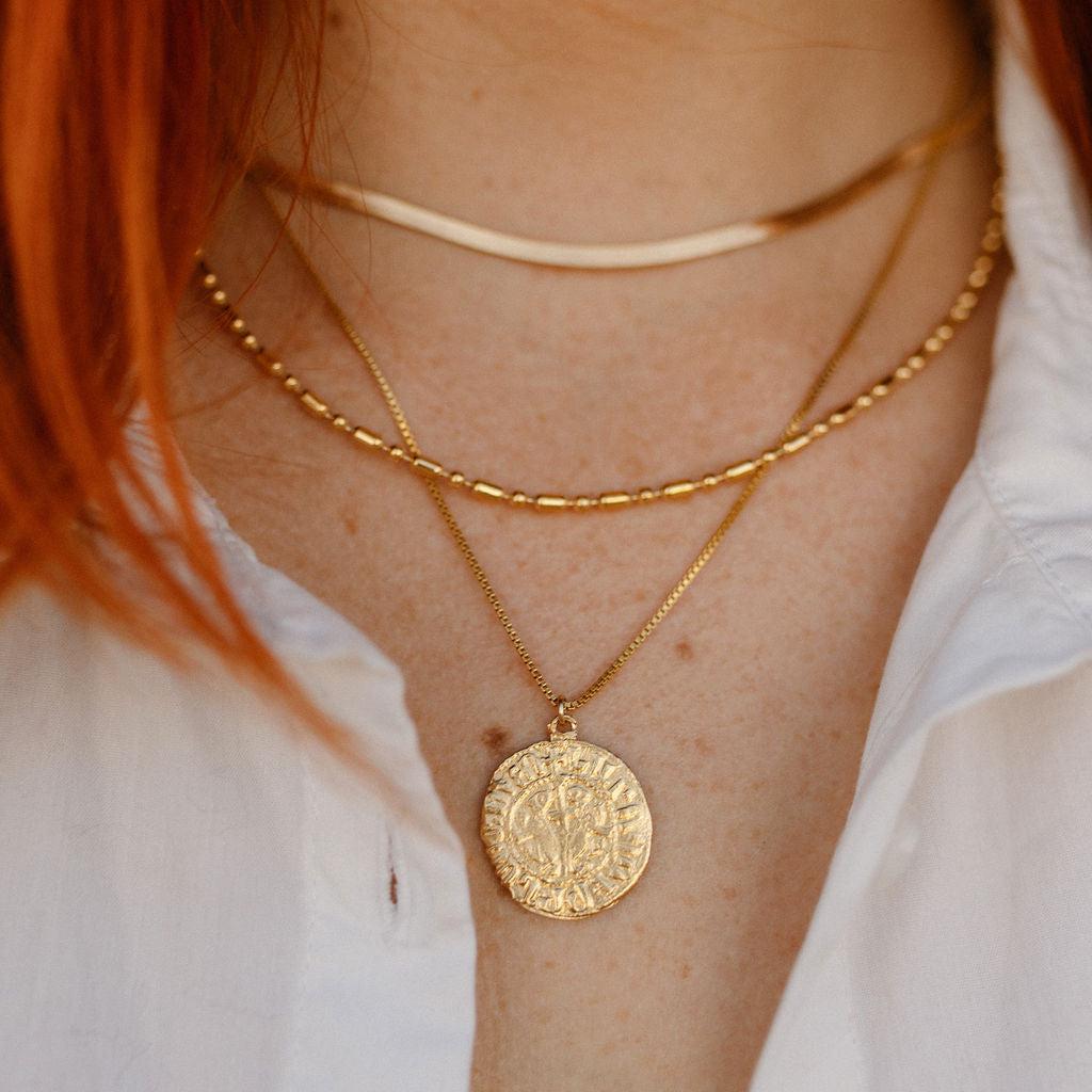 Unique, deadstock vintage ball chain necklace made current with a fresh plating of 14k gold. A perfect 90s vibe chain; use it to layer or add your favorite pendant. This 90's ball chain necklace comes with a long and short pattern. Designed and handmade in Los Angeles.