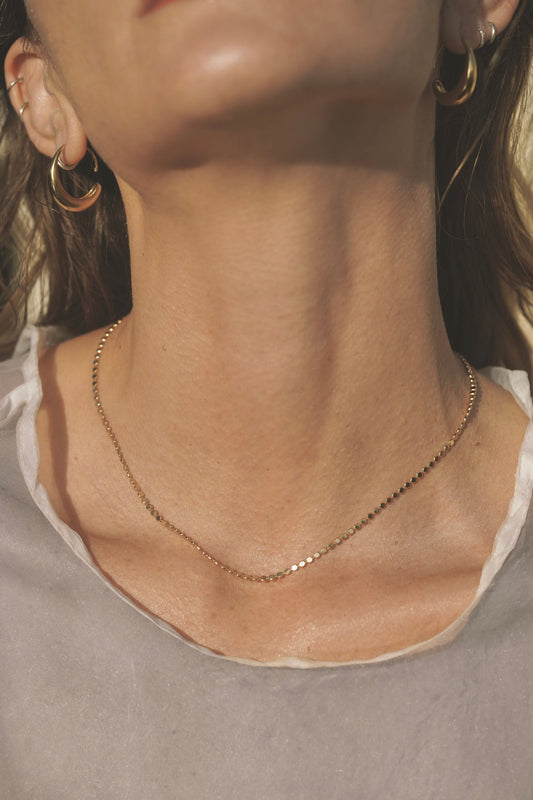 Gold layering necklace handmade in California.