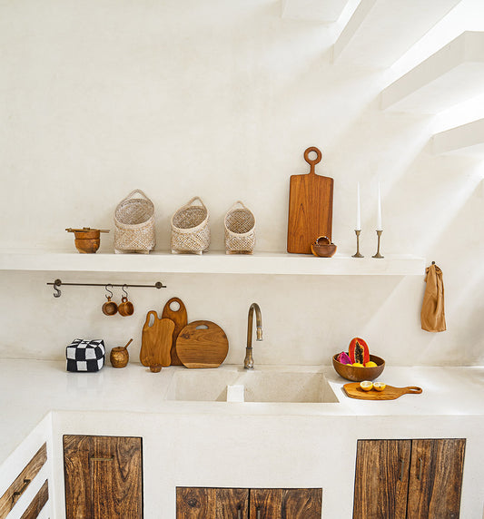 This oversized teak wooden serving board offers an eye-catching tabletop design, perfect for serving or chopping.