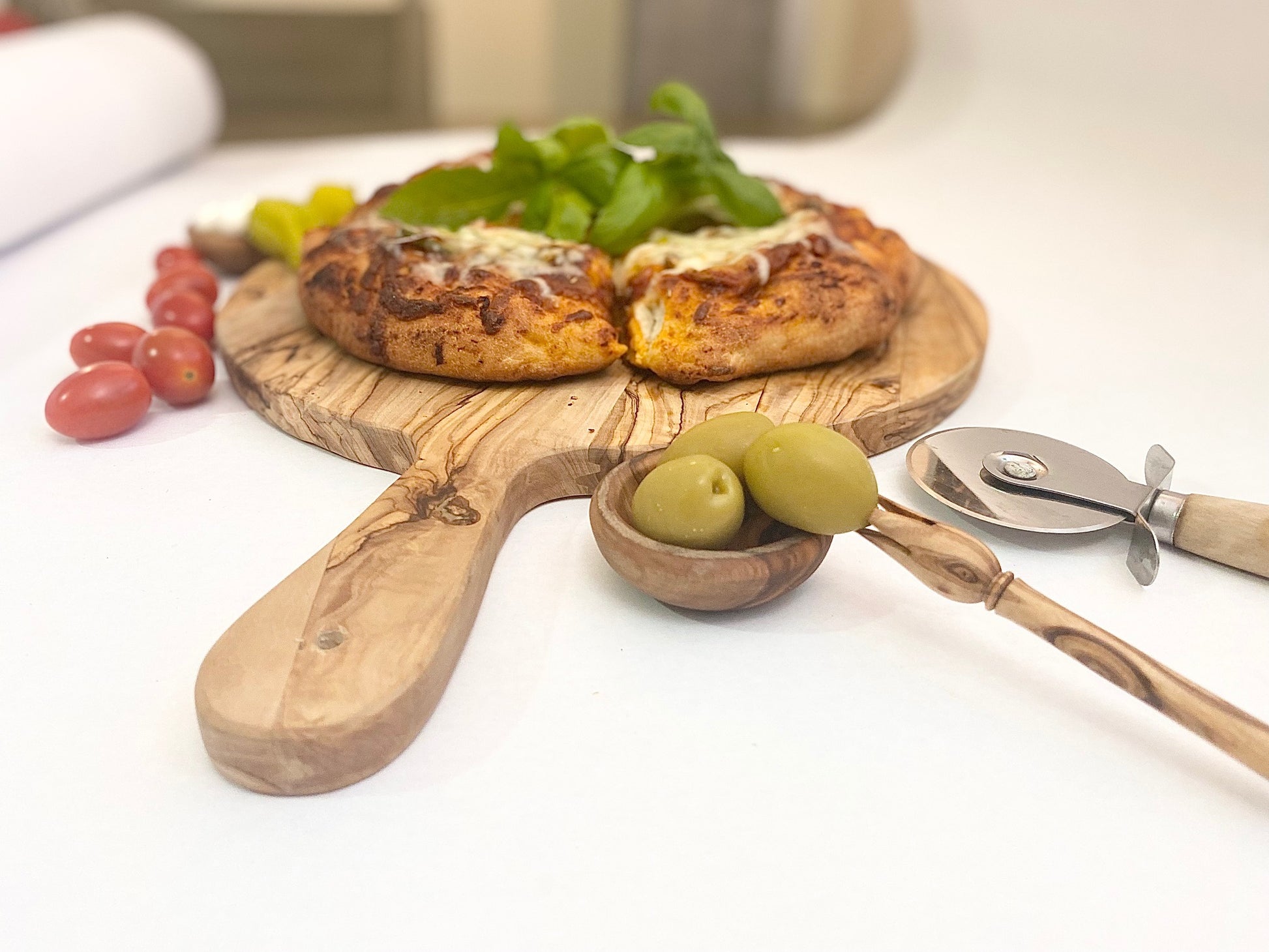 handmade olive wood pizza / serving board