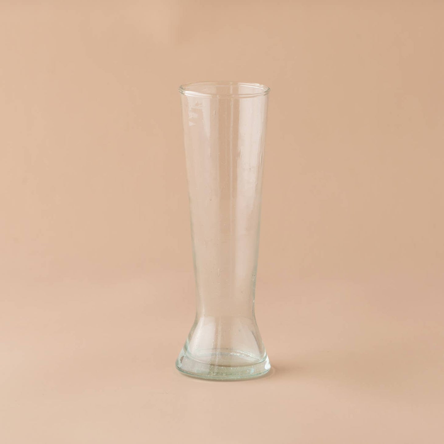 Enjoy your favorite champagne of choice in this sophisticated and elegant flute. Handblown in morocco using local recycled glass, giving these materials another life. hampagne flute by saarde