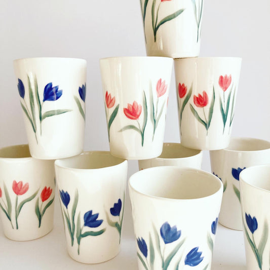 tulips ceramic cup / Slip casted ceramic cups in dover white (off white) and painted with blue tulips. Handmade by Alicja in her Vermont studio.