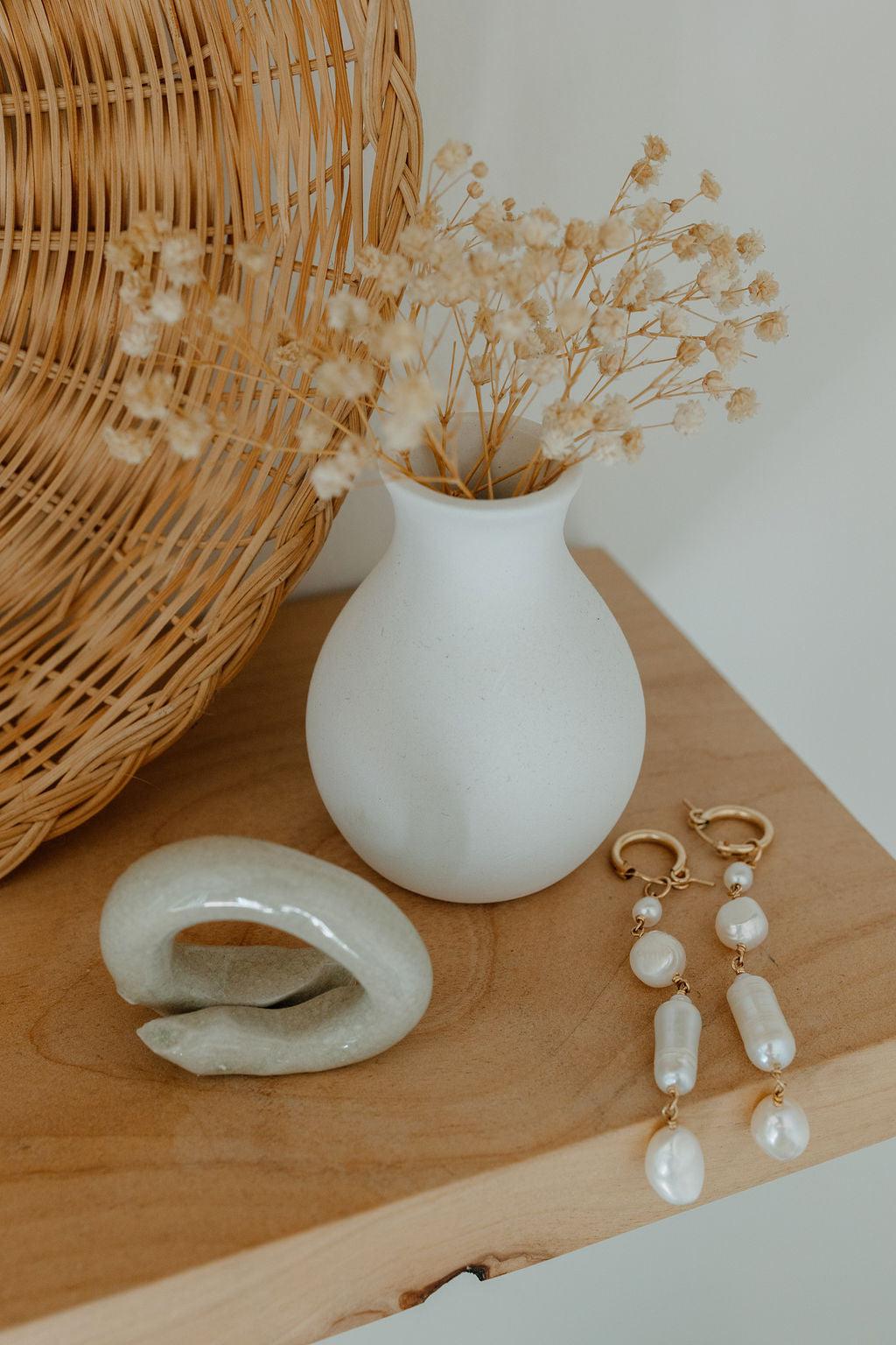 Unique and elegant, these pearl duster earrings were designed with 4 freshwater pearls in various shapes and sizes interconnected with delicate gold fill wire. All Dea Dia pieces are proudly designed and handmade in Downtown Los Angeles.