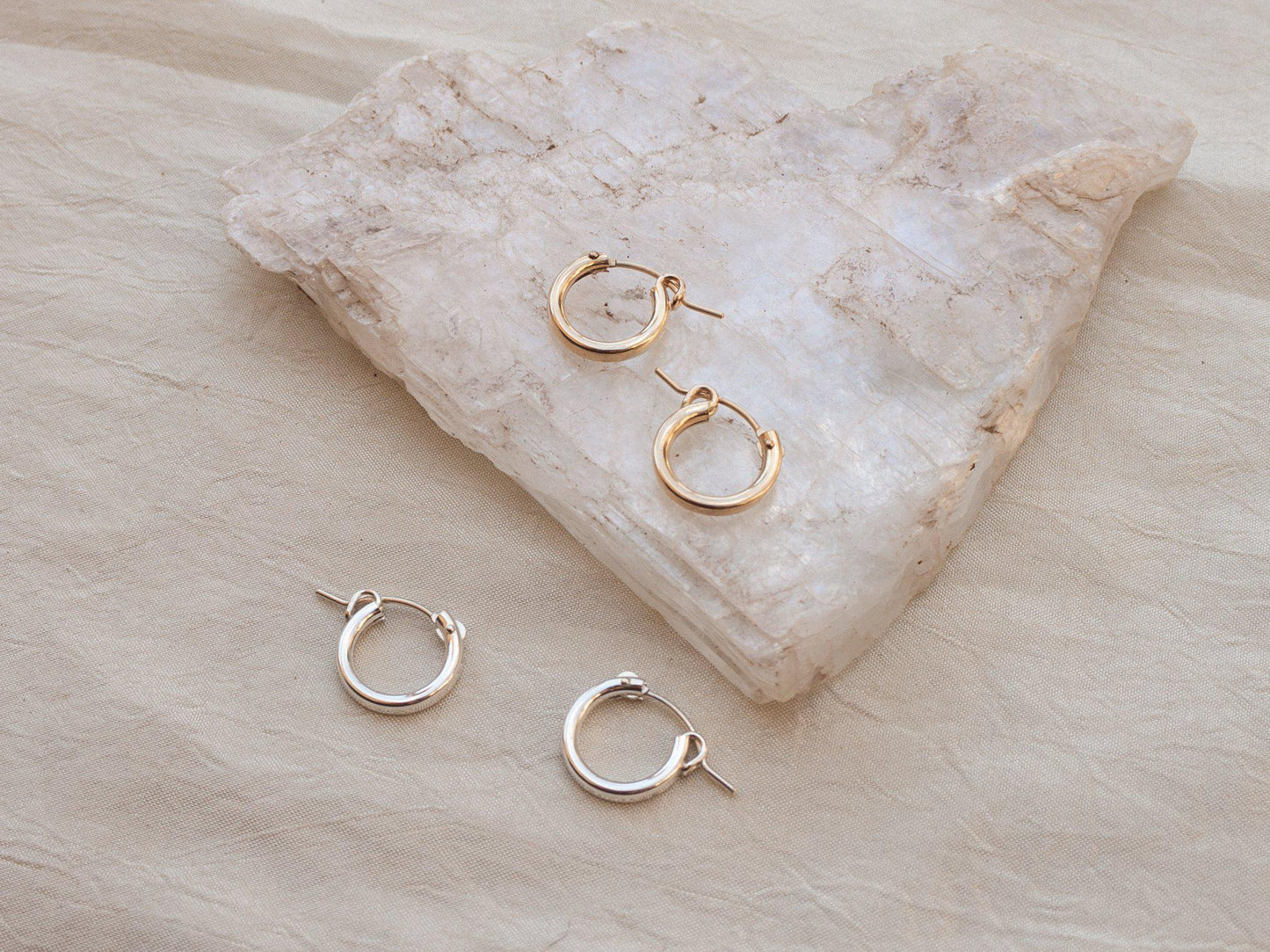 Click hoop earrings might be basic, but never boring. Just the right size to put them in and forget about them but still manage to look put together, a total win! Sterling silver or gold fill, featuring hollow tubes with click-close mechanism. Designed and handmade in Los Angeles.