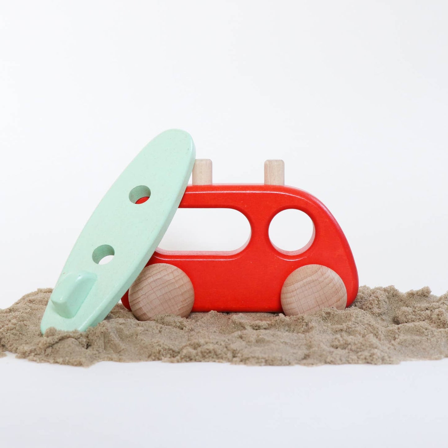Wooden car with removable surfboard made sustainably