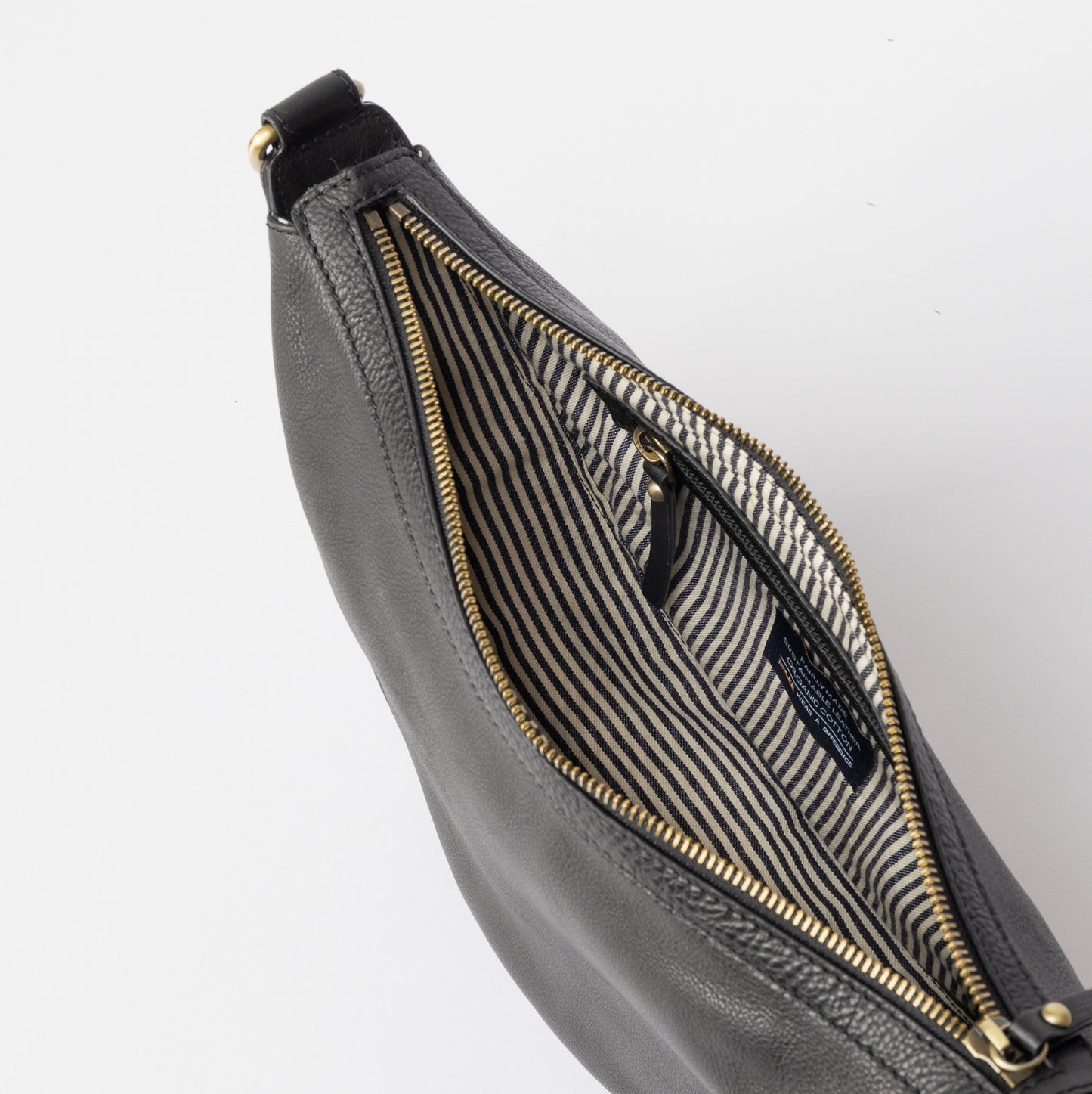 The Leo cross body bum bag can be worn across the body as a bum bag, or on the shoulder as chic arm candy. Leo is unisex, catering to everyone who embraces that bumbag style. Made in India.