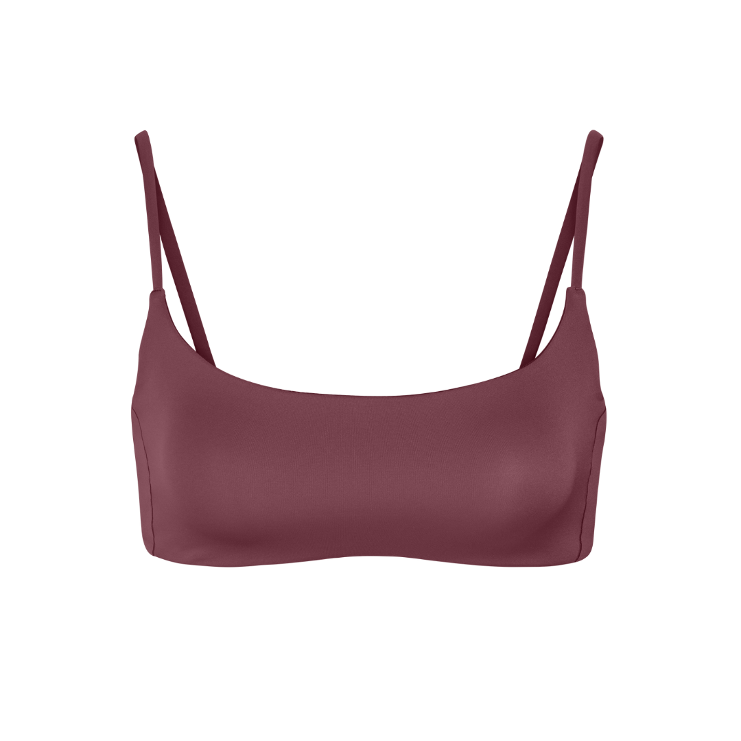 Is it a swim top? Is it a surf top? Is it a sports bra? Is it the best ever? Yes to all of the above. A scoop front, medium coverage bikini top built for smaller busts (A-C cup). One of Left on Friday's best selling tops, for good reason, with its insanely soft, smoothing coverage fabric.