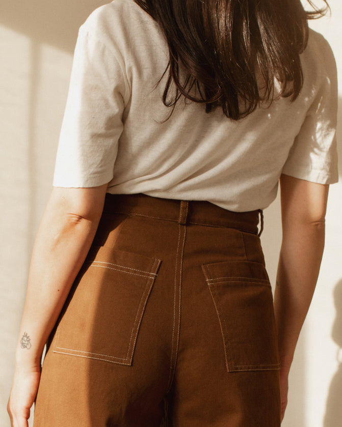 For the ultimate cool girl vibe! Based on Harly Jae's bestselling, form-fitting Pierrot Pants, this new style features a higher waist, unique back pockets, and cool contrast stitching - for a true ode to the 70s era. Handmade with organic cotton blend in Vancouver, BC.