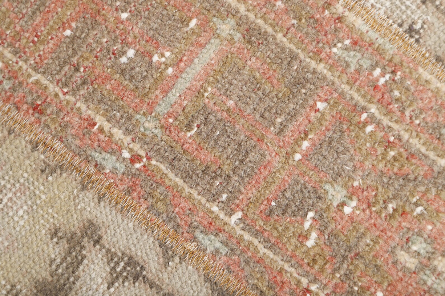 Gorgeous vintage rug from Turkey with earth toned colors and intricate, yet subtle designs. Measures 3.4 x 4.7' and made from 50% cotton and 50% wool. This Turkish rug has been professionally washed before we received it so it is 100% clean and ready to use.