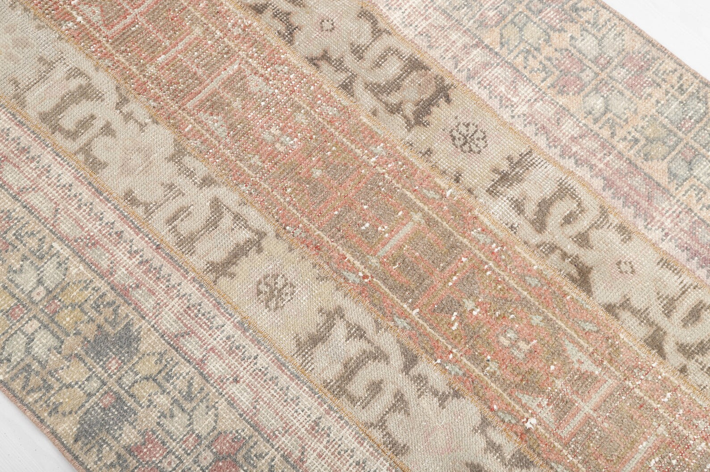 Gorgeous vintage rug from Turkey with earth toned colors and intricate, yet subtle designs. Measures 3.4 x 4.7' and made from 50% cotton and 50% wool. This Turkish rug has been professionally washed before we received it so it is 100% clean and ready to use.
