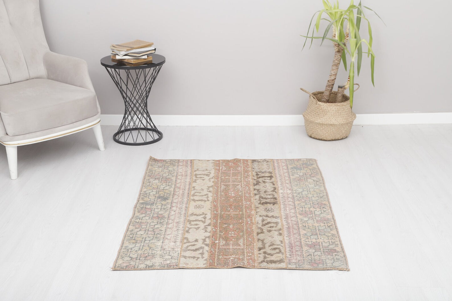 Gorgeous vintage rug from Turkey with earth toned colors and intricate, yet subtle designs. Measures 3.4 x 4.7' and made from 50% cotton and 50% wool. This Turkish rug has been professionally washed before we received it so it is 100% clean and ready to use.