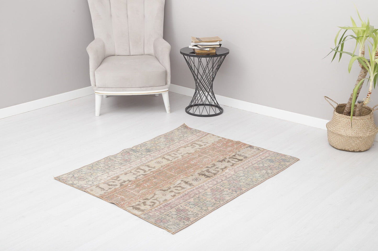 Gorgeous vintage rug from Turkey with earth toned colors and intricate, yet subtle designs. Measures 3.4 x 4.7' and made from 50% cotton and 50% wool. This Turkish rug has been professionally washed before we received it so it is 100% clean and ready to use.
