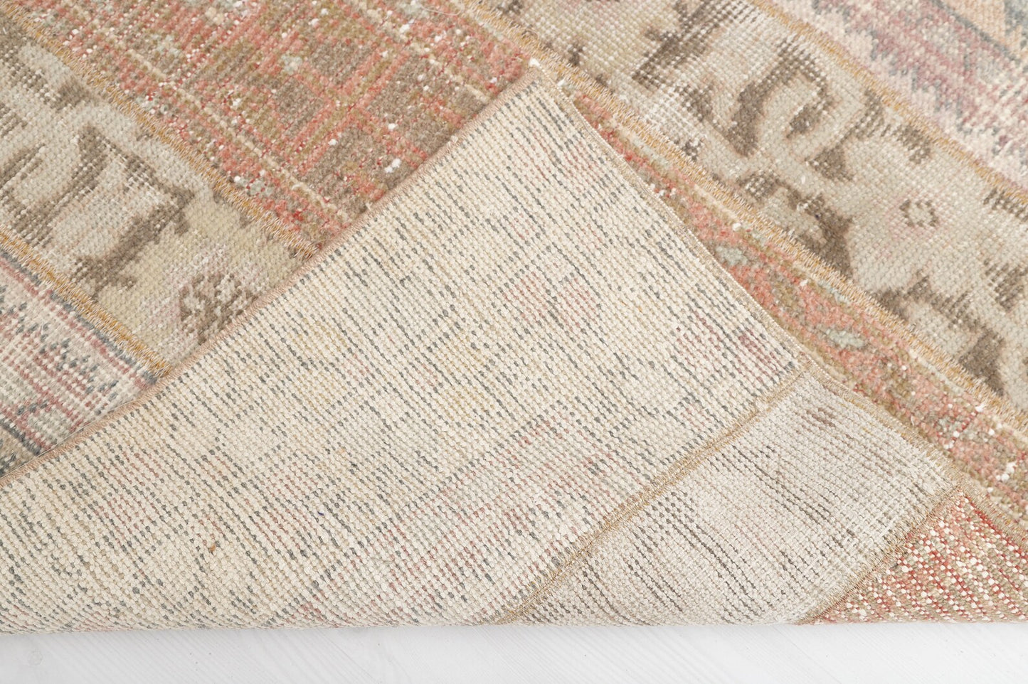 Gorgeous vintage rug from Turkey with earth toned colors and intricate, yet subtle designs. Measures 3.4 x 4.7' and made from 50% cotton and 50% wool. This Turkish rug has been professionally washed before we received it so it is 100% clean and ready to use.