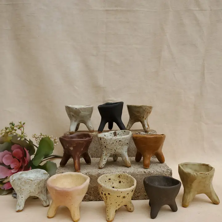 Curious clay ceramic "tripod" spice holders are unique and handmade