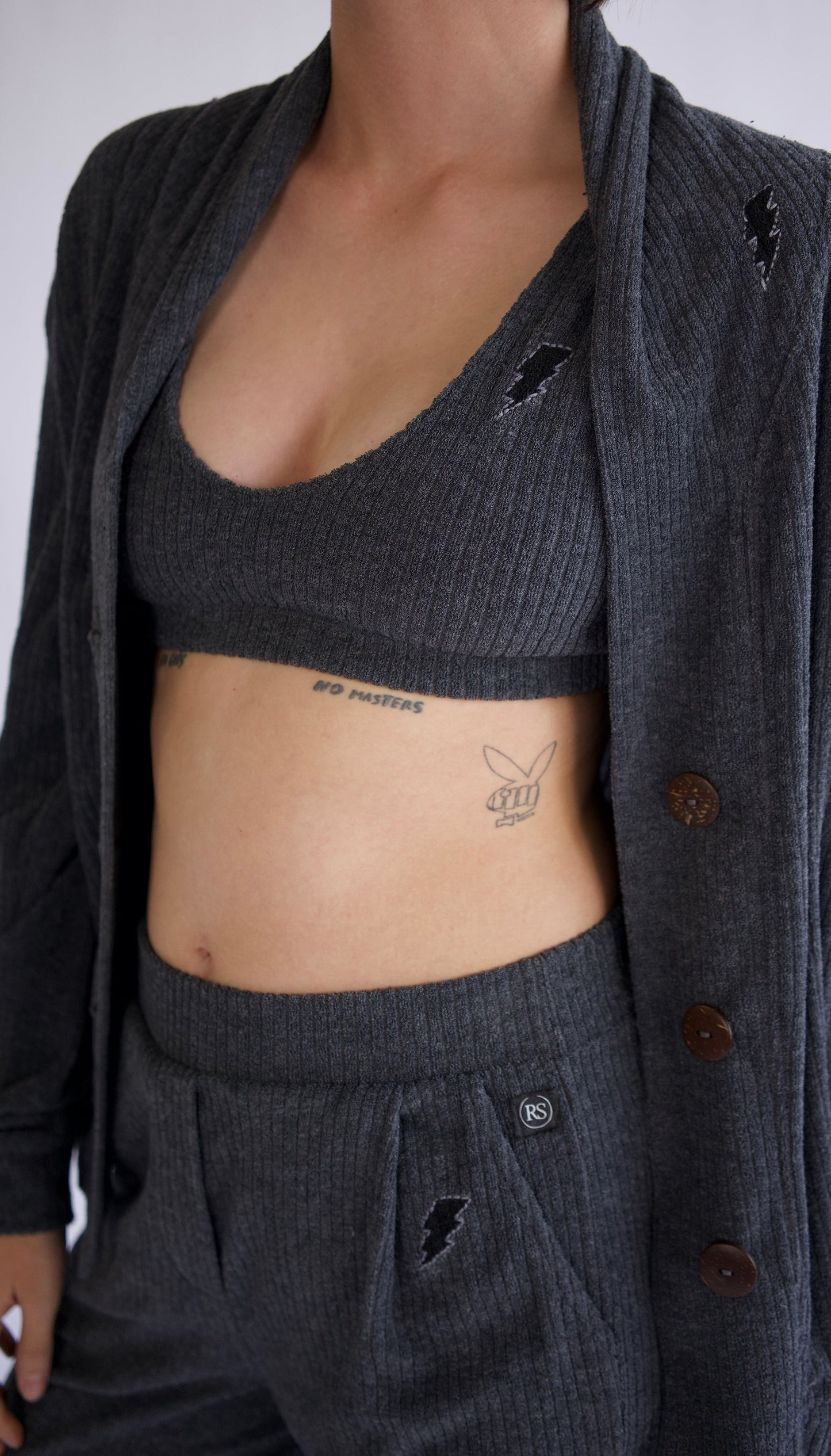 70’s inspired terry drop needle rib cardigan, charcoal dyed in small batches of 4 pieces at a time, each piece is unique. Chic yet uber comfy!