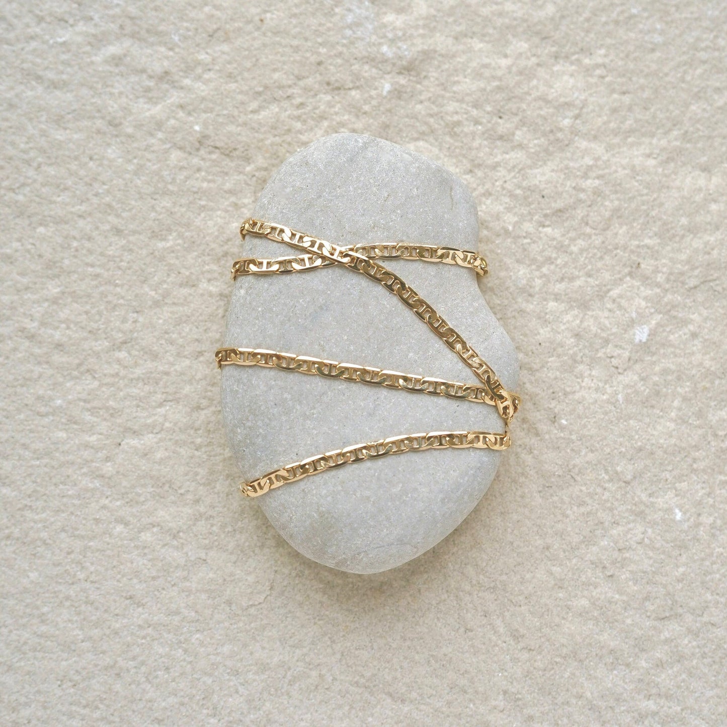 A simple braided chain intended to provide a ring of protection and luck when worn. 18k gold filled chain. Handmade in the Santa Cruz Mountains.