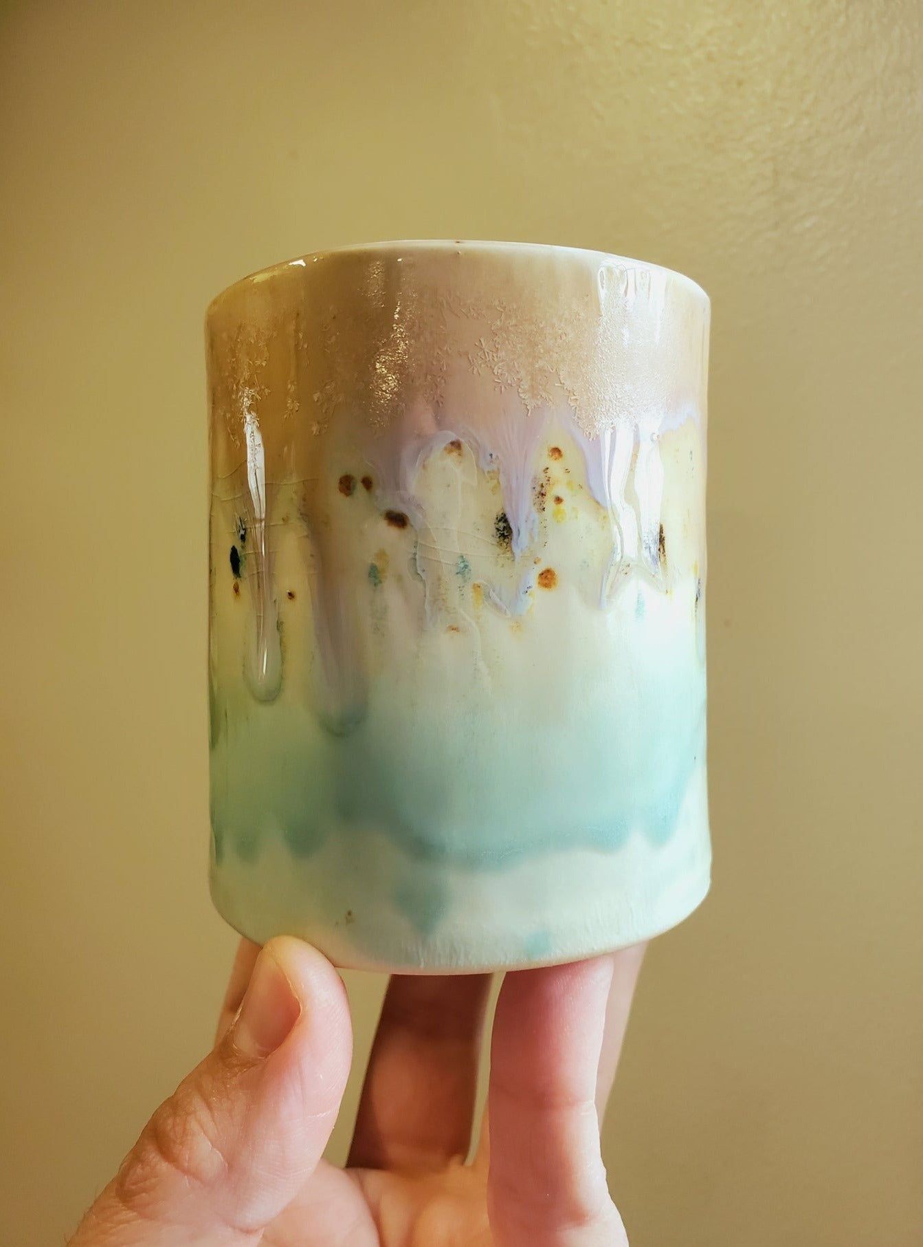 Handmade ceramic tumbler that is just perfect for all of your entertaining needs (including cocktails). Features gold luster accents for all of your celebrations and sure to impress.