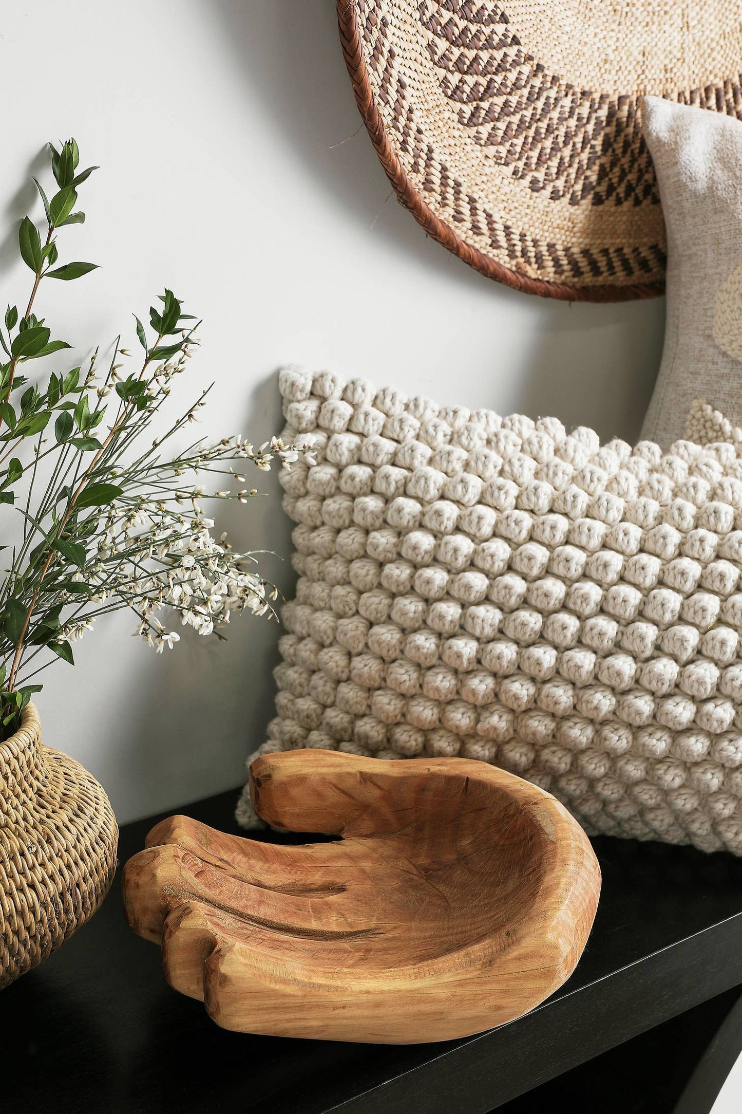An elegant wood bowl hand-carved in South Africa from a single piece of sustainably sourced Blue Gum eucalyptus.