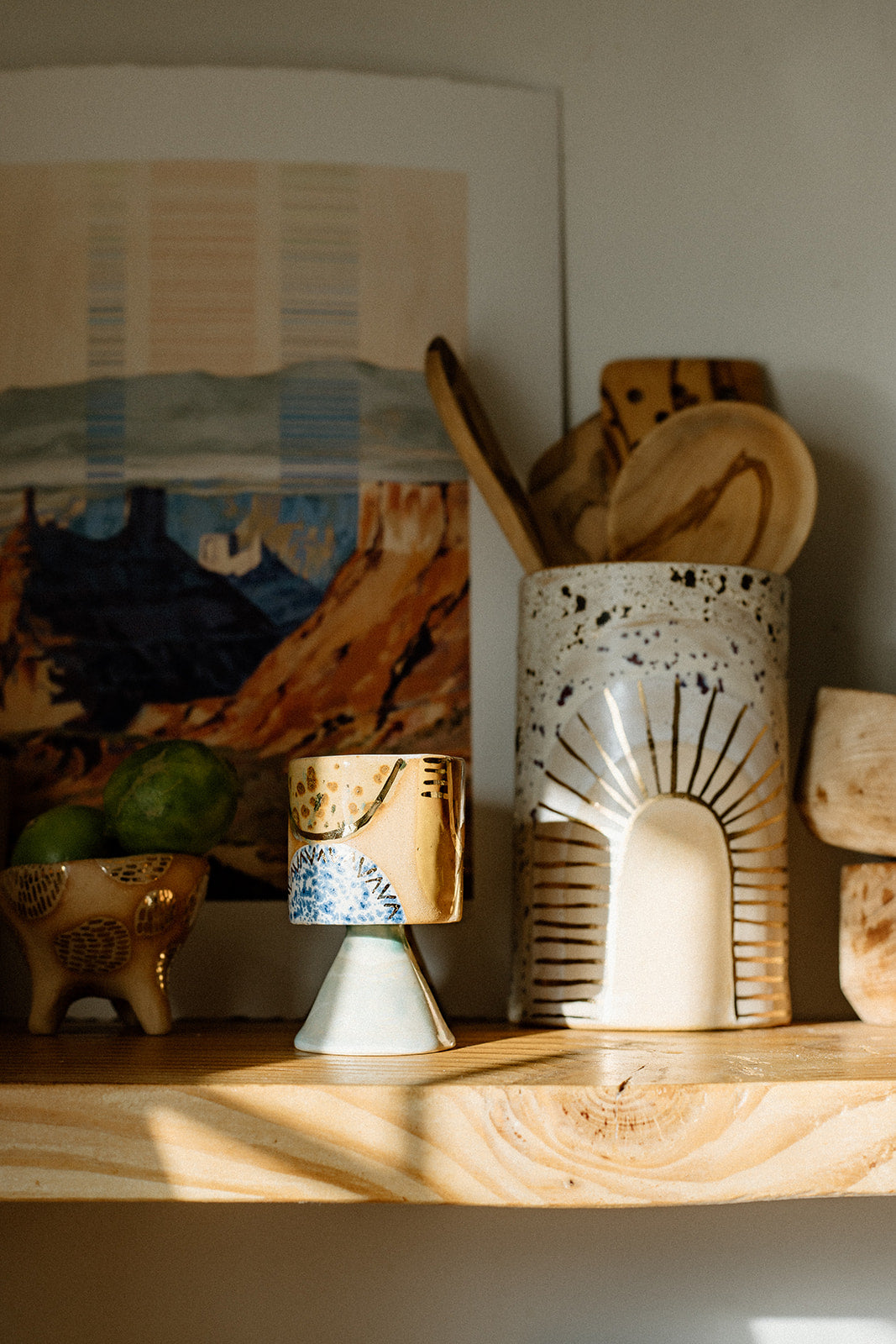 Handmade ceramic mug with stem that is just perfect for all of your entertaining needs (including cocktails). Features gold luster accents for all of your celebrations and sure to impress.