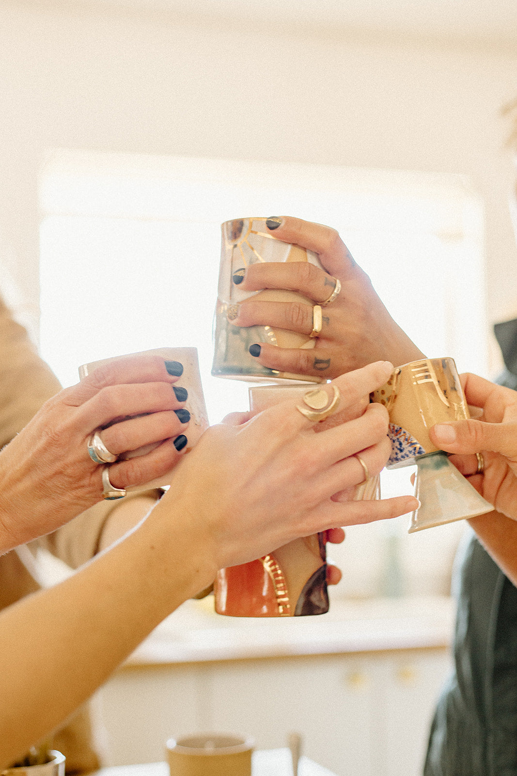 Handmade ceramic mug with stem that is just perfect for all of your entertaining needs (including cocktails). Features gold luster accents for all of your celebrations and sure to impress.