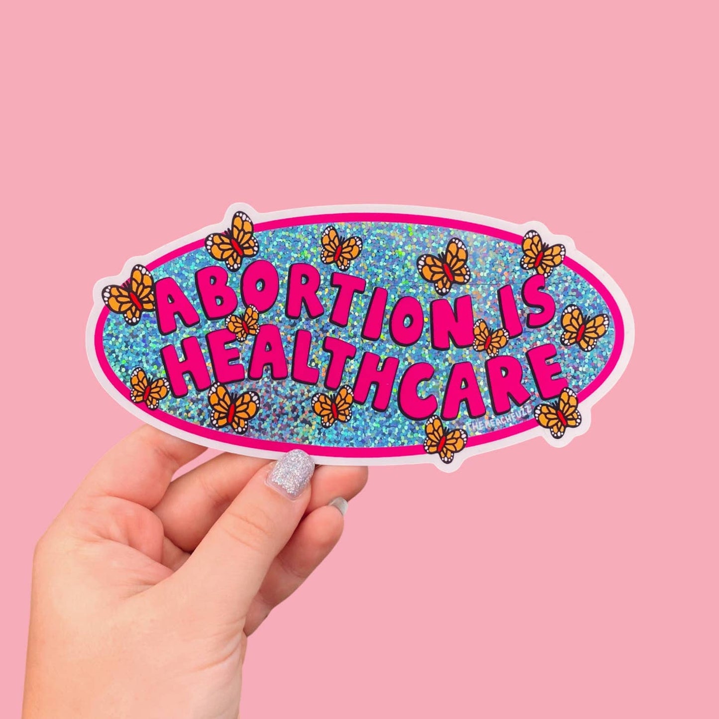 Vinyl water resistant sticker with glossy finish and glitter detail. Abortion is healthcare. Duh. You and I know that, but unfortunately there’s still plenty of people who don’t. So let’s plaster it everywhere! And make it sparkly! And cute!