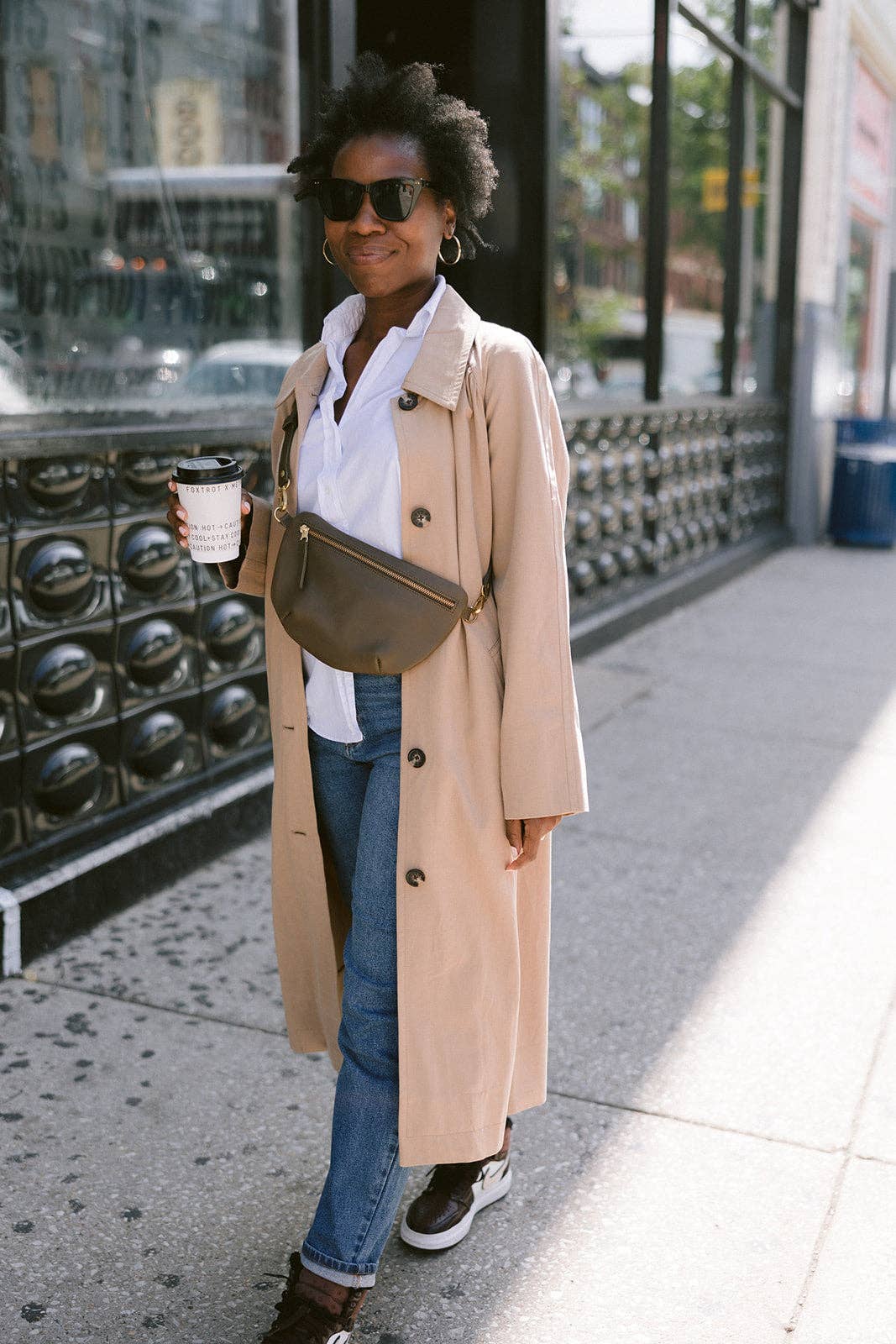 Fair trade and adjustable leather sling bag/fanny pack. Adjust the length to fit your needs. Handcrafted, vegetable tanned leather sling bag made in Kenya with locally and ethically-sourced materials. A portion of sales go to an organization in Tanzania empowering children living on the street.