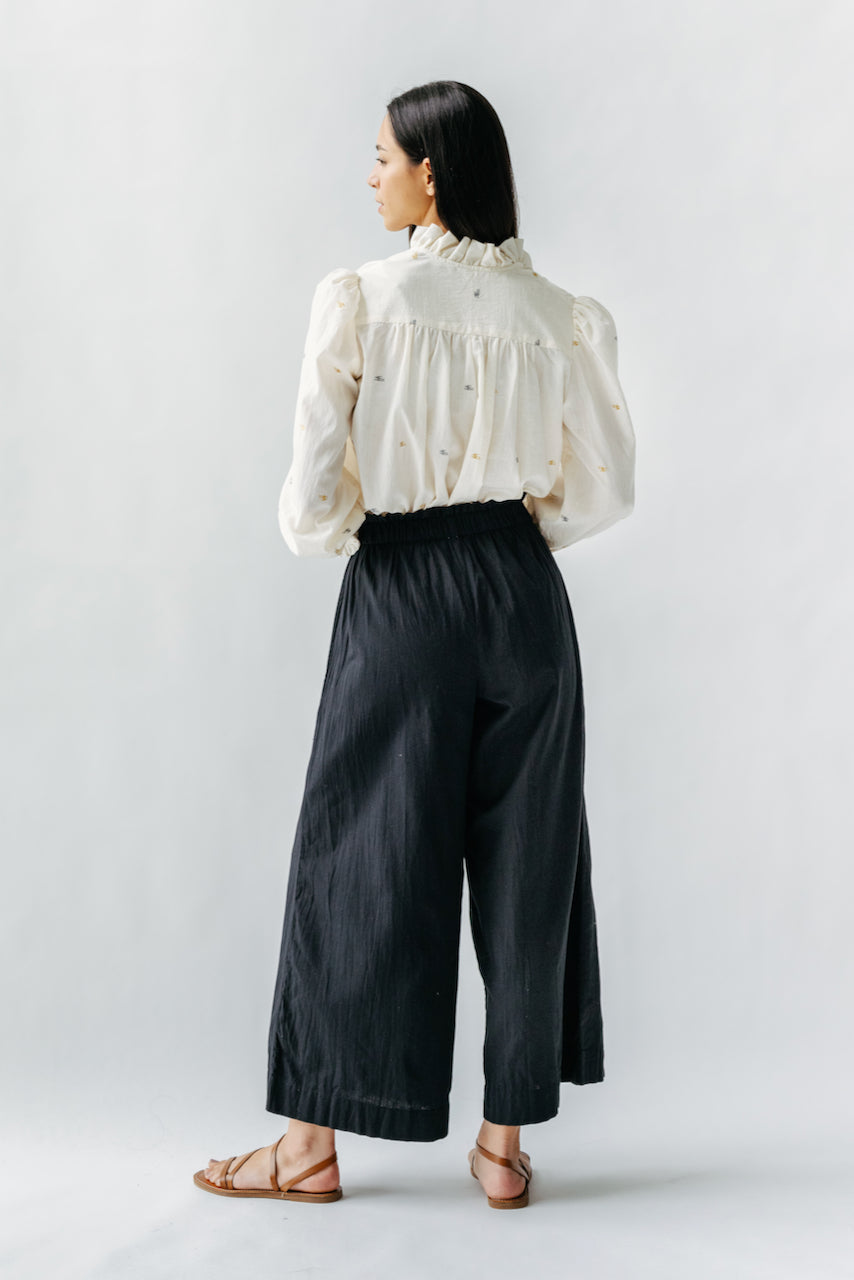 This paperbag waist pant is comfy, roomy, high waisted and wide legged. Wear it seaside with a swimsuit or with your favorite blouse tucked in. Ethically made in India.