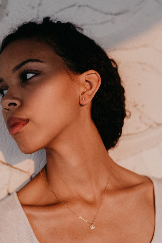 Tiny vibrant Australian Opals set in 14k gold vermeil prongs on sterling silver posts. Handmade in the Santa Cruz Mountains.