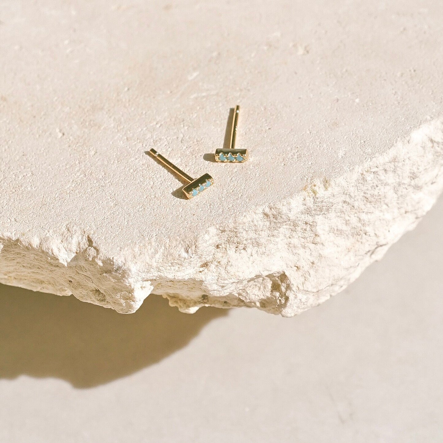 Nile Earrings by Mountainside Jewelry. Delicate bar earrings with triple pave set stones. 14k Vermeil on sterling silver. Handmade in the Santa Cruz Mountains.