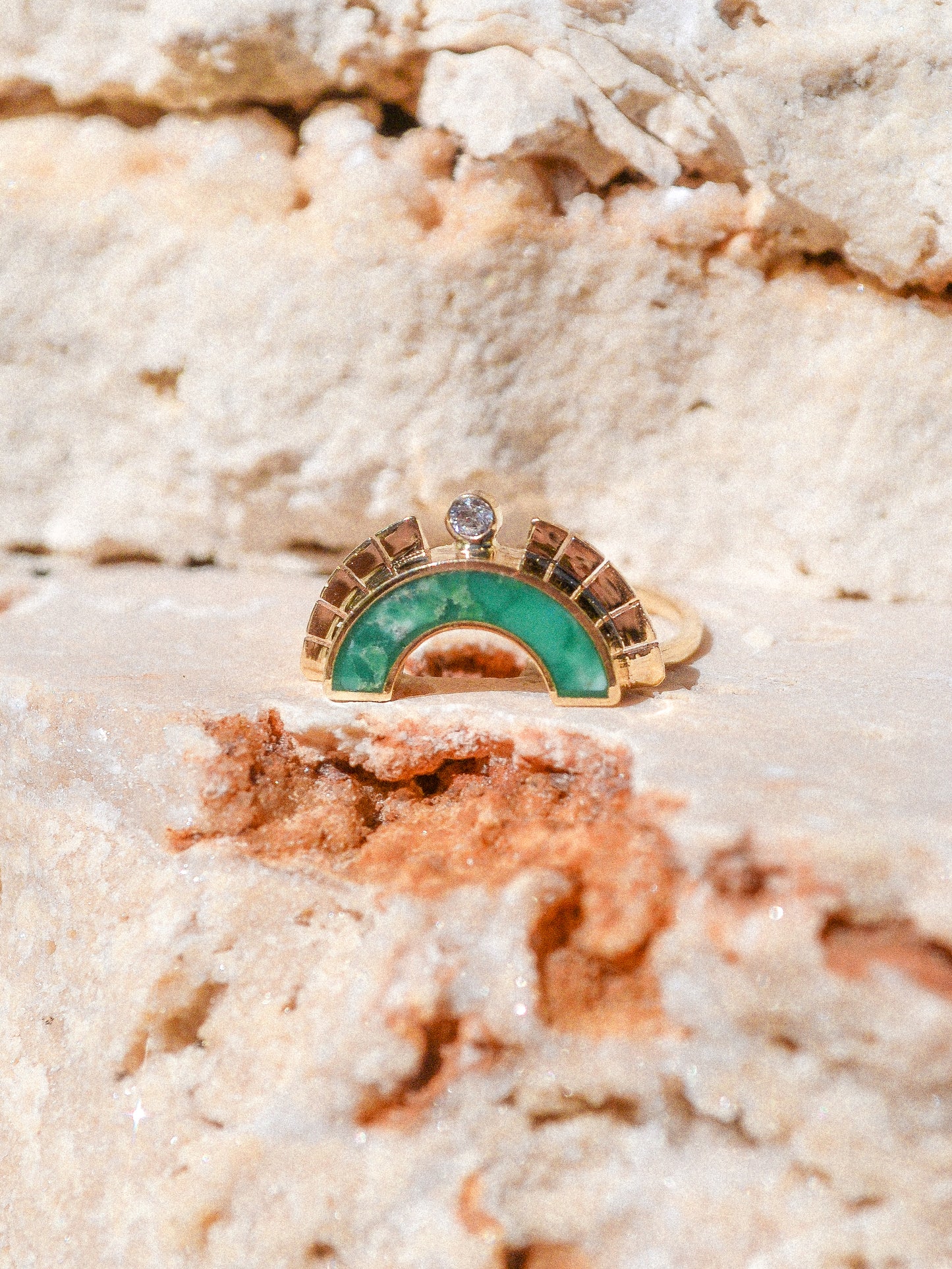 RISING SOL ARCH CROWN / The inlaid Broken Arrow turquoise is hand cut and shaped to fit perfectly inside this 14K gold bezel. A Young in the Mountain signature carved halo features a .03 ct conflict-free white diamond that brings beautiful light to this piece