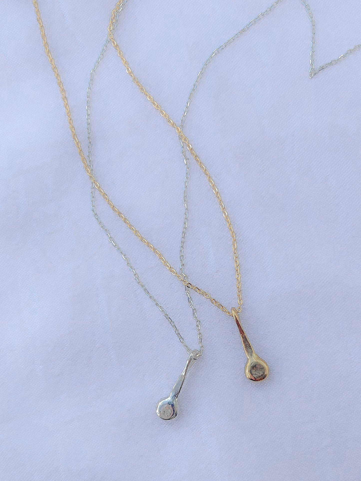 Handmade simple talisman necklace to adorn your neck. Sustainably made in northern California by Amanda Hunt.