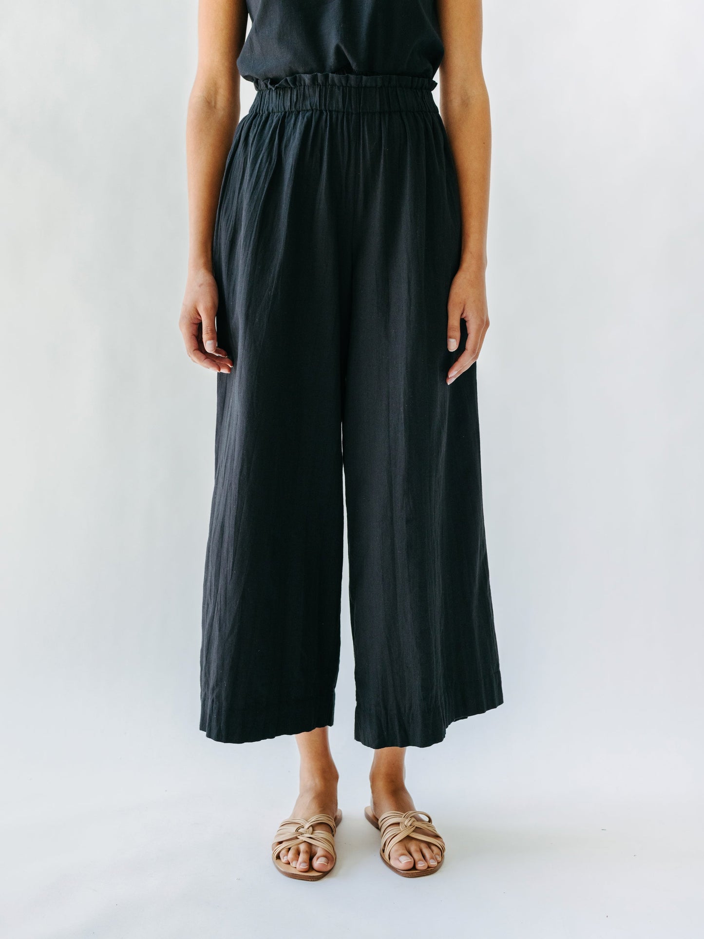 This paperbag waist pant is comfy, roomy, high waisted and wide legged. Wear it seaside with a swimsuit or with your favorite blouse tucked in. Ethically made in India.