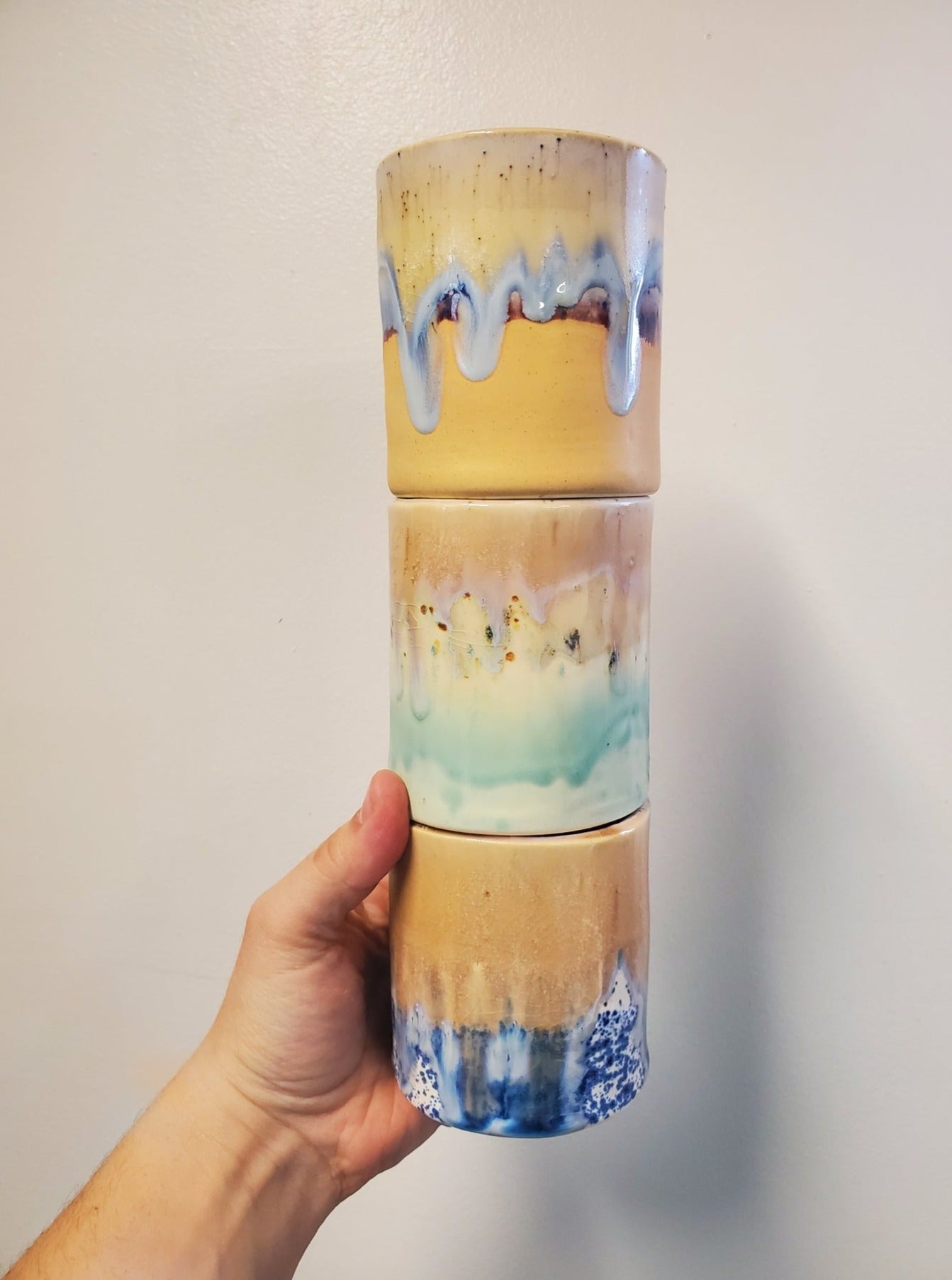 Handmade ceramic tumbler that is just perfect for all of your entertaining needs (including cocktails). Features gold luster accents for all of your celebrations and sure to impress.
