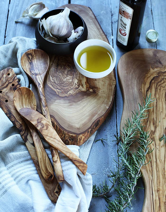 Handcrafted in Tunisia using natural olive wood from the region, this corner spoon kitchen utensil is hard, durable and non porous. Each piece is unique and becomes even darker, richer and more beautiful in color as it ages.