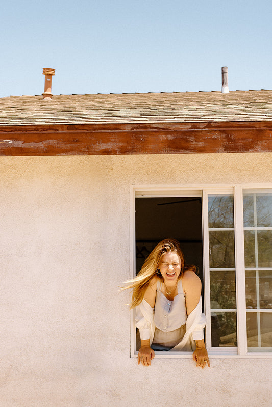 Sustainable lifestyle store Thread Spun owner, Heidi, wears linen clothing by Sugar Candy Mountain