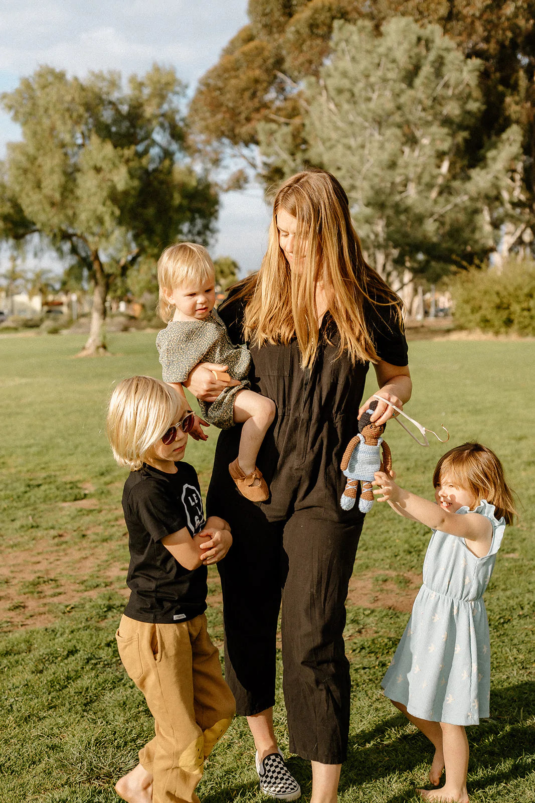Thread Spun sustainable kids store owner, Heidi with her three children wearing Tiny Cottons