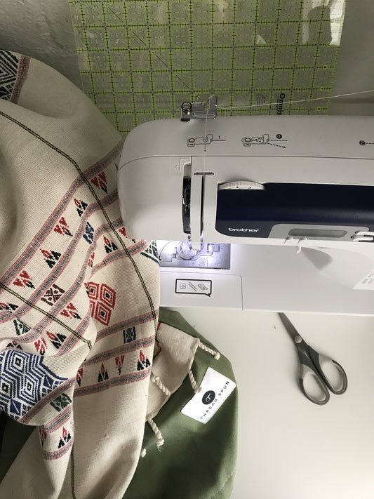 Thread Spun creates handmade goods including surfboard bags and clutches using artisan and fair trade fabrics like this. 