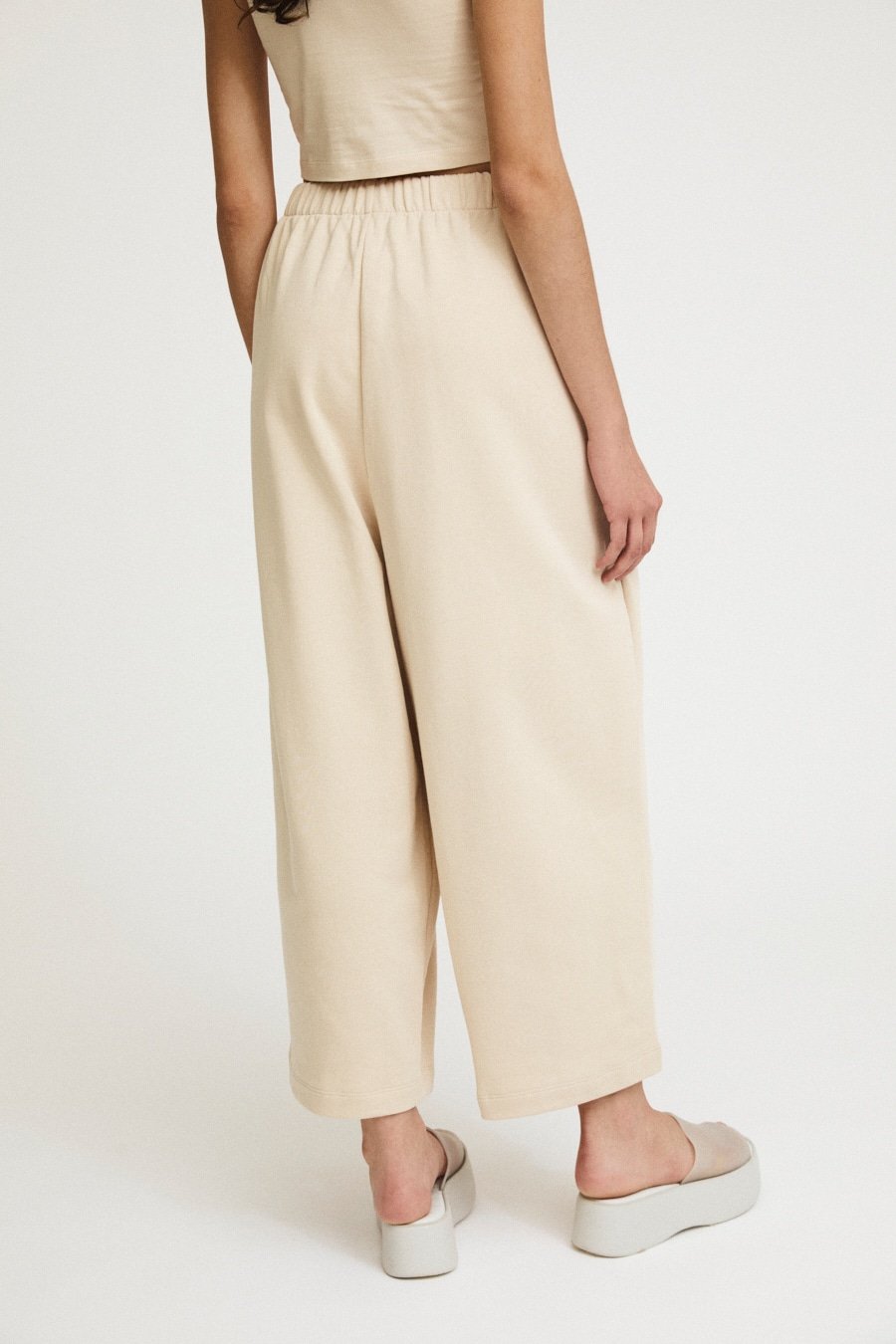 rita row wanda maxi pant / Curved cotton knit pants for all-day wear. High rise with elastic waistband with adjustable drawstring and curved leg. 100% organic cotton. Ethically made in Portugal.