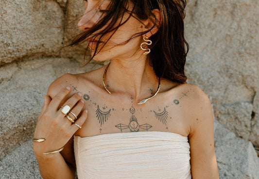 An often maligned species, we find beauty in the powerful serpent. Asymmetrical snake earrings available in brass and sterling silver. All Dea Dia pieces are proudly designed and handmade in Downtown Los Angeles.