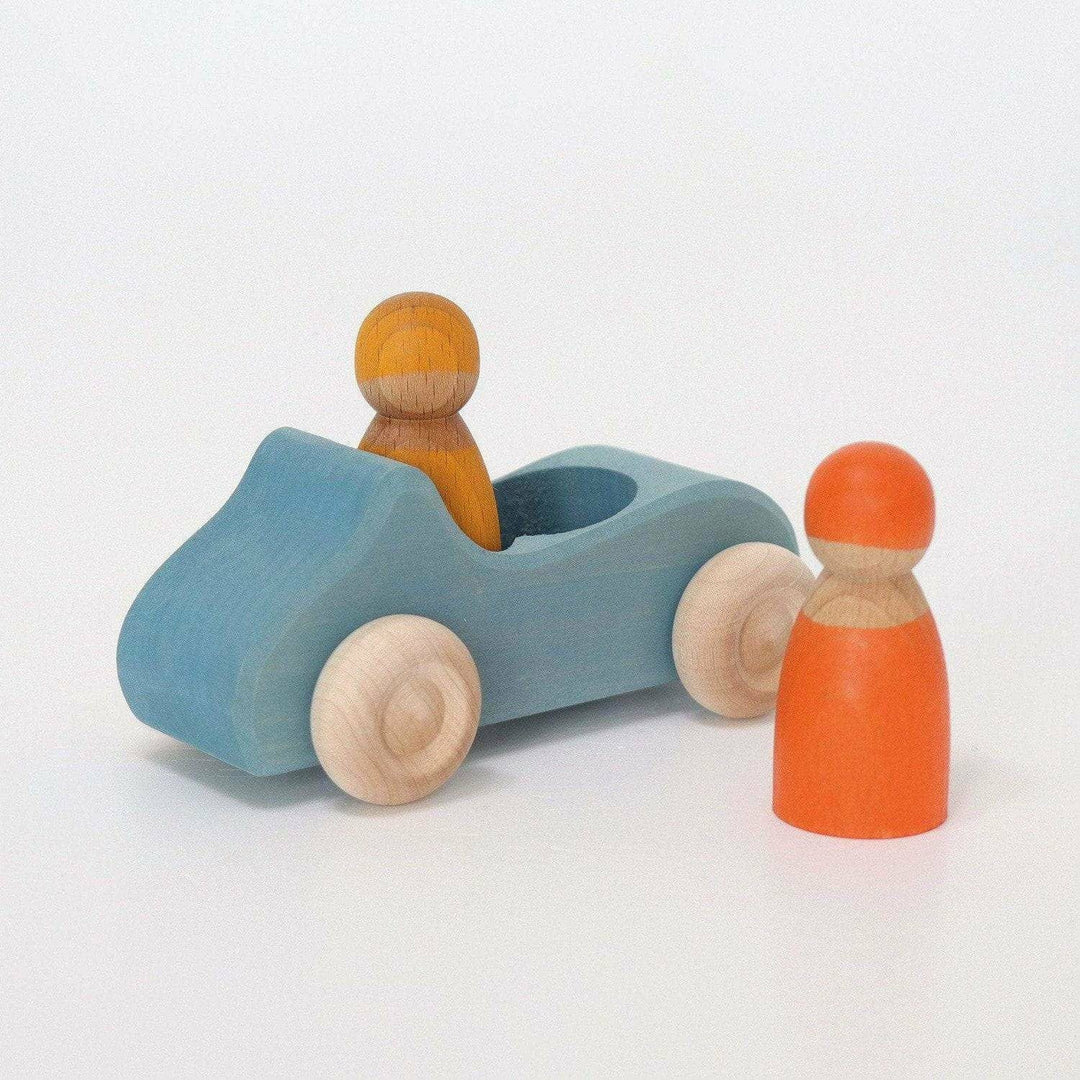 A large convertible car in blue with two peg friends by Grimms.