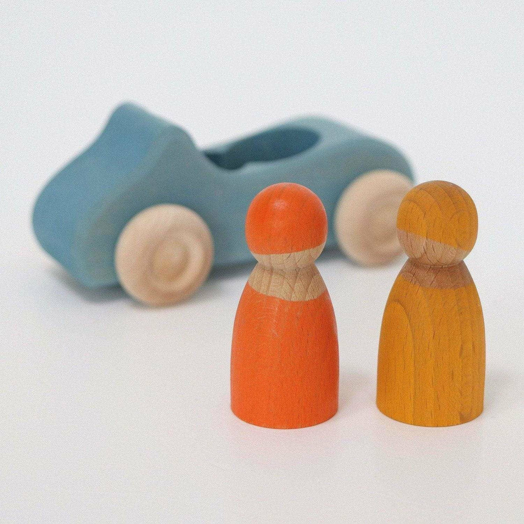 A large convertible car in blue with two peg friends by Grimms.