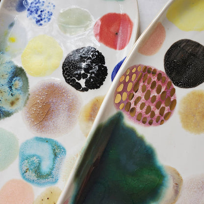 ceramic curious clay / Handmade snack tray featuring colored splotches and gold luster to turn any cocktail or dinner party up a notch. Each tray features one-of-a-kind glaze applications and is completely unique. The perfect host or hostess gift!