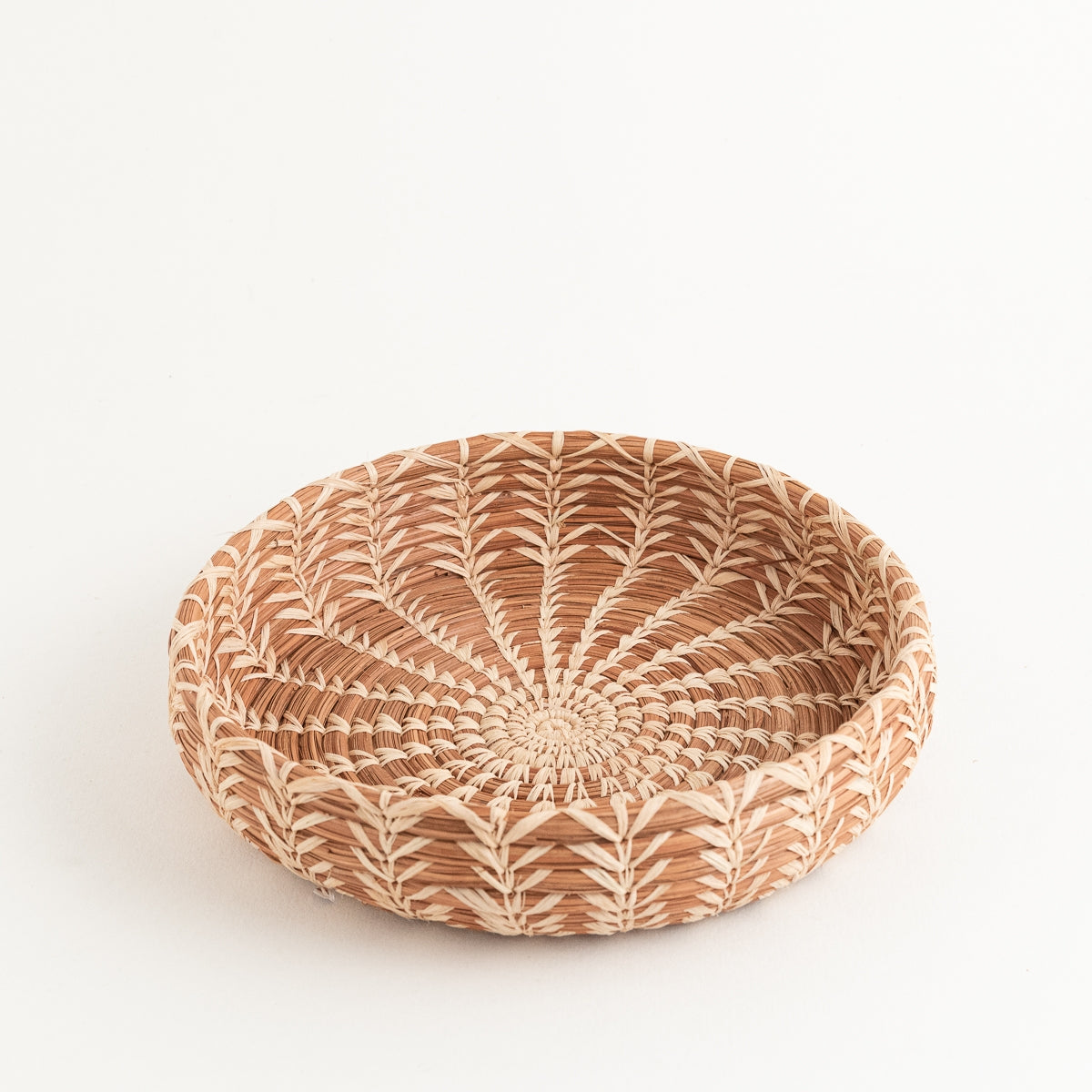 Handwoven Ceila Basket designed by Mayan Hands artisan partners in La Fe, this fragrant basket also enhances the lives of the women who created it.