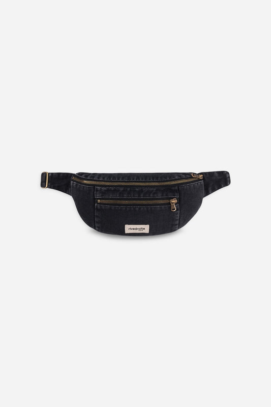 The Orsel allows you to carry all your daily essentials with its rectangular shape and 2 compartments. Slip your credit cards in the small zip compartment, and your larger essentials in the main one. Made with recycled denim and end-of-stock textile industry fabrics. Designed in Paris, France.
